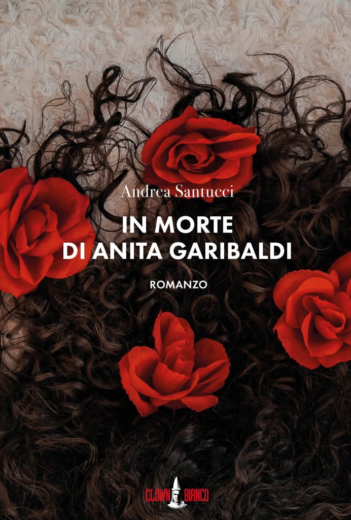 Quattro rose rosse su testa di capelli ricci