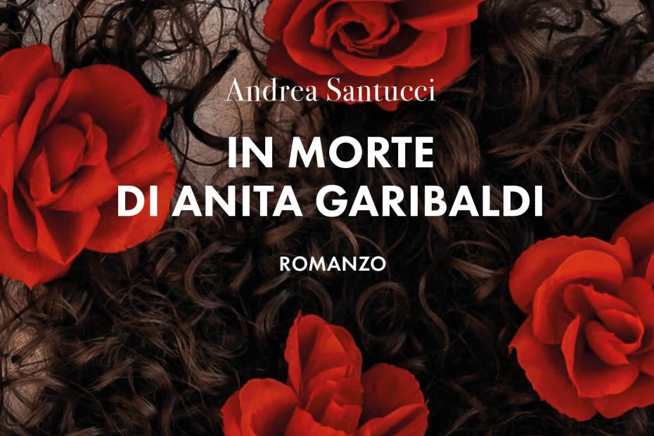 Quattro rose rosse su testa di capelli ricci
